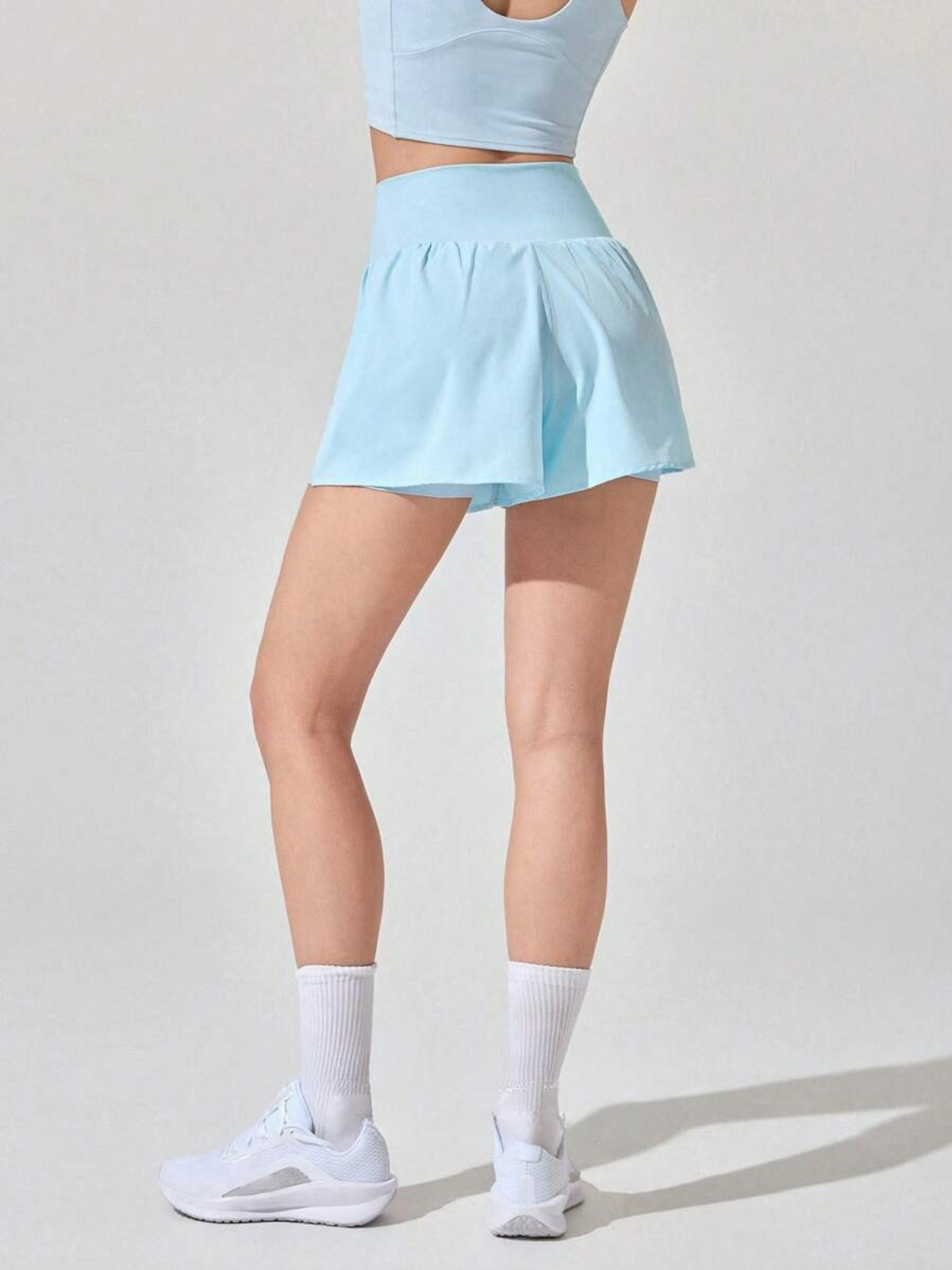 Spodenki do biegania odporne na pot, kieszenie o średnim stanie, szybkoschnące